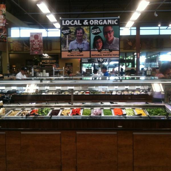 Photo taken at Whole Foods Market by John K. on 12/3/2012