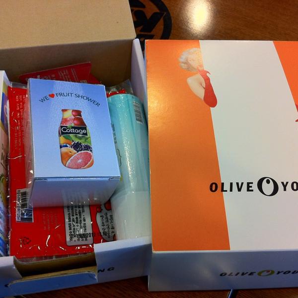 Photo taken at 올리브영 (OLIVE YOUNG) by Stella K. on 12/21/2012