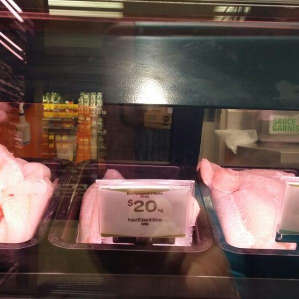 Photo taken at Woolworths by J.Z on 3/27/2015