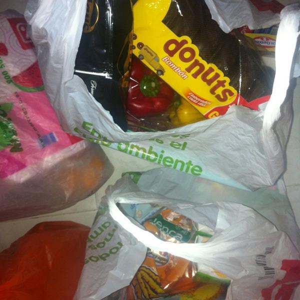 Photo taken at DIA % by Dulce M. on 10/20/2012