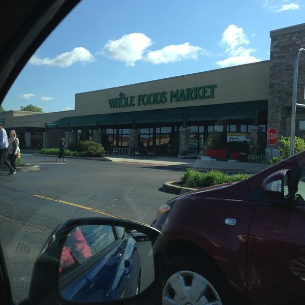 Photo taken at Whole Foods Market by Kelly H. on 5/12/2013