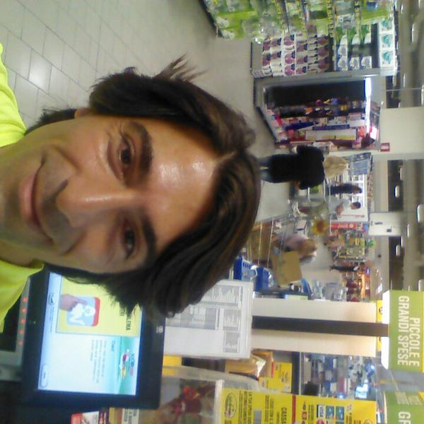 Photo taken at Coop Strada del Paradiso, Siena by Cem T. on 8/21/2013