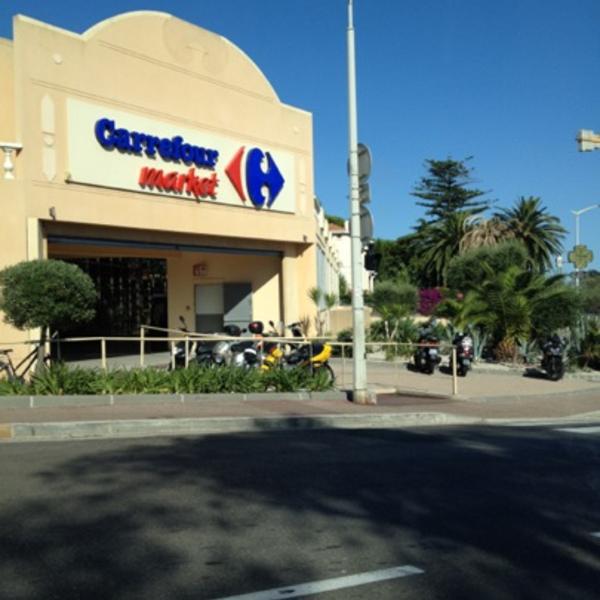 Photo taken at Carrefour by Kira K. on 7/18/2012