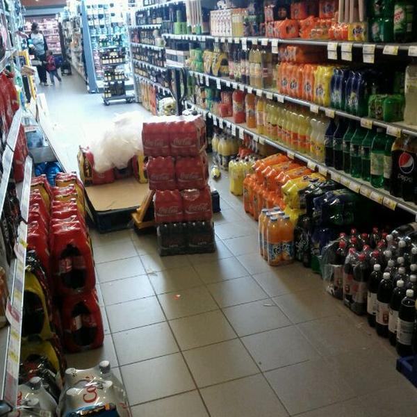 Photo taken at Proxy Delhaize by Grisha on 6/1/2011