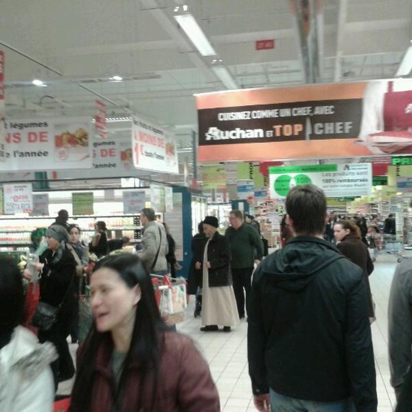 Photo taken at Auchan by Gustavo C. on 3/23/2013