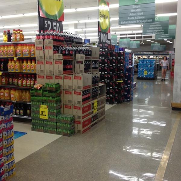 Photo taken at Woolworths by