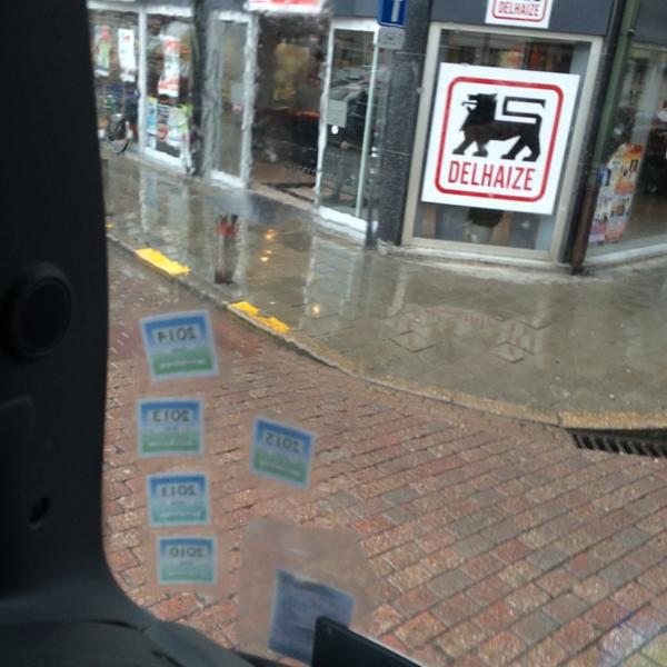 Photo taken at Proxy Delhaize by Tom V. on 5/8/2014