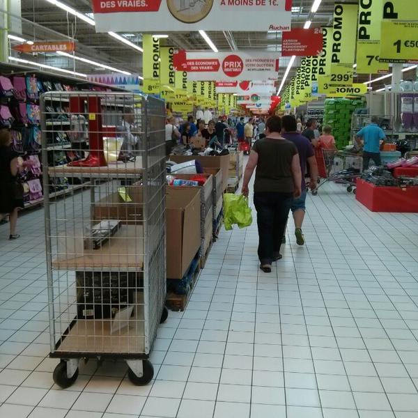 Photo taken at Auchan by Tom on 8/15/2013