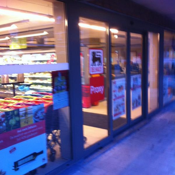 Photo taken at Proxy Delhaize by Bart W. on 3/15/2013