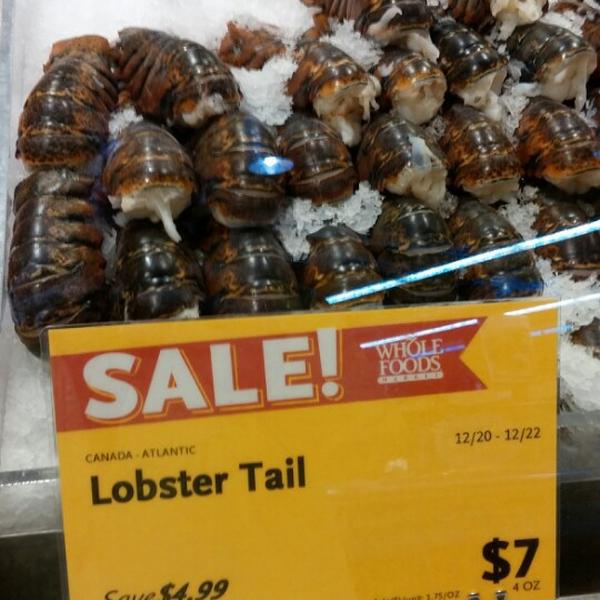 Photo taken at Whole Foods Market by Julie F. on 12/20/2013