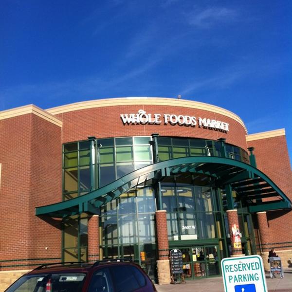 Photo taken at Whole Foods Market by Chris T. on 2/18/2012
